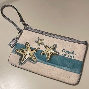 COPY - NWOT COACH Off White Canvas Metallic Leather Trim Wristlet.